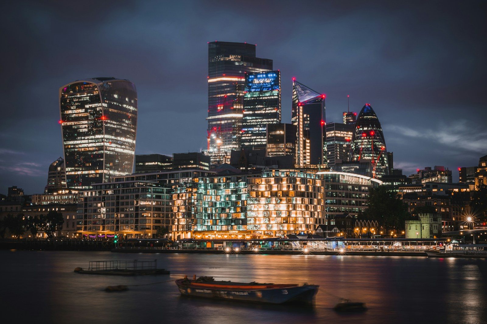 Evening view across the Thames to the towers of the City of London